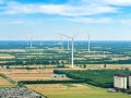 单机8.5MW！时代绿能梁山140MW风电项目全容量并网，高塔巨擎“捕风”鲁西南